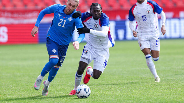 Iceland midfielder Arnor Sigurdsson (#21) competes with Haiti midfielder Woodensky Pierre (#24) during an international friendly match between Haiti and Iceland at BMO Field in Toronto, Ontario, Canada, on March 31, 2026.