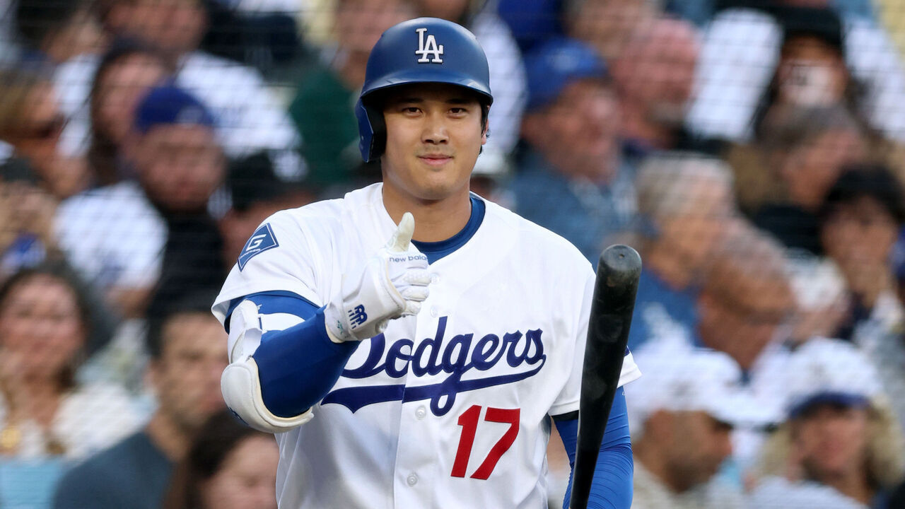 LOS ANGELES, CALIFORNIA - MAY 27: Shohei Ohtani #17 of the Los Angeles Dodgers signals his readiness to bat to the umpire, after pitching, during the first inning against the Colorado Rockies at Dodger Stadium on May 27, 2026 in Los Angeles, California.