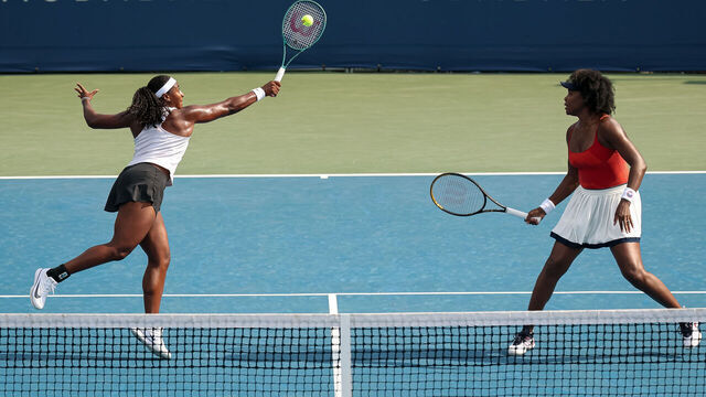 WASHINGTON, DC - JULY 23: Hailey Baptiste (L) and Venus Williams in action against Shuai Zhang and Taylor Townsend during a women's doubles match on day 3 of the Mubadala Citi DC Open 2025 at William H.G. FitzGerald Tennis Center on July 23, 2025 in Washington, DC.