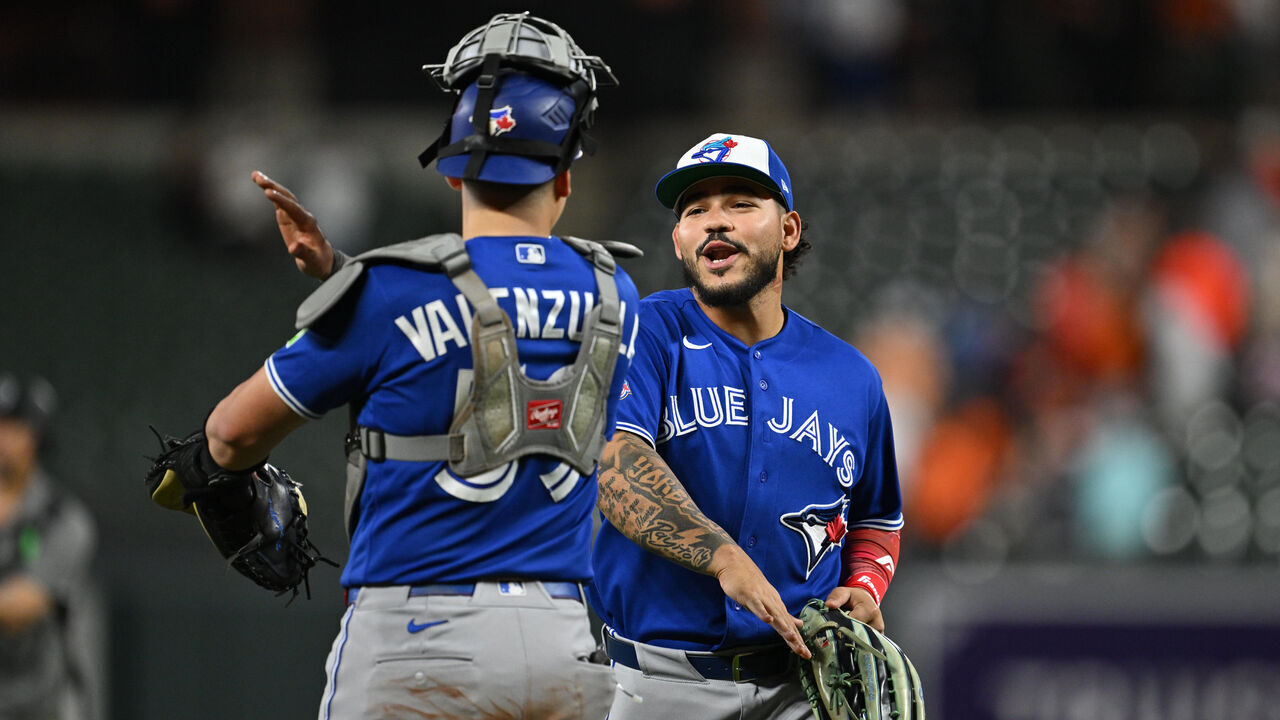 BALTIMORE, MD - MAY 28: Yohendrick Piñango #24 of the Toronto Blue Jays celebrates with Brandon Valenzuela #59 after defeating the Baltimore Orioles 2-1 at Oriole Park at Camden Yards on May 28, 2026 in Baltimore, Maryland.