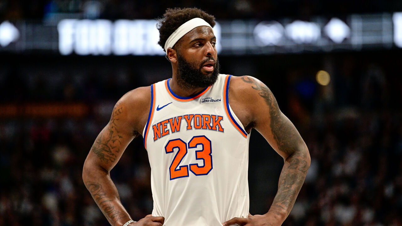 DENVER, COLORADO - MARCH 6: Mitchell Robinson #23 of the New York Knicks reacts to a play in the first half against the Denver Nuggets at Ball Arena on March 6, 2026 in Denver, Colorado.