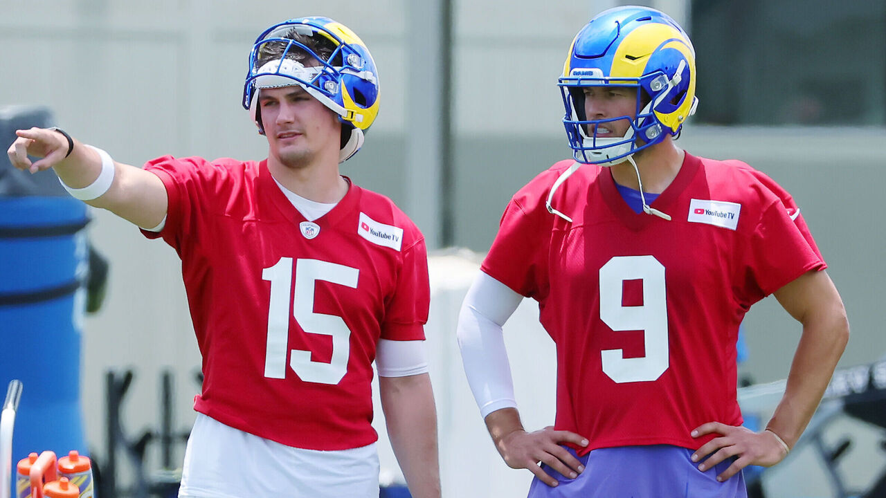 WOODLAND HILLS, CALIFORNIA - MAY 28: Ty Simpson #15 confers with Matthew Stafford #9 of the Los Angeles Rams during an organized team activities workout at Rams Village at the Warner Center on May 28, 2026 in Woodland Hills, California.