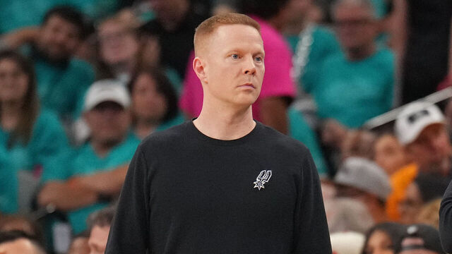 OKLAHOMA CITY, OK - MAY 22: Associate Head Coach Sean Sweeney and Head Coach Mitch Johnson of the San Antonio Spurs look on during the game against the Oklahoma City Thunder during Game Three of the NBA Western Conference Finals on May 22, 2026 at Paycom Center in Oklahoma City, Oklahoma. Mandatory Copyright Notice: Copyright 2026 NBAE