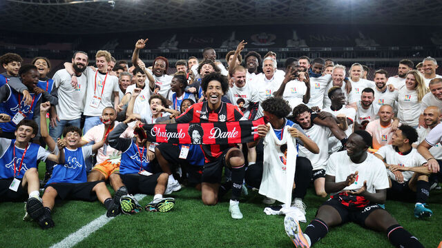 Nice's Brazilian defender #04 Dante (C) celebrates with team members after winning the L1-L2 playoff second-leg football match between first divison club OGC Nice and second division club AS Saint-Etienne at the Allianz Riviera Stadium in Nice, south-eastern France, on May 29, 2026.