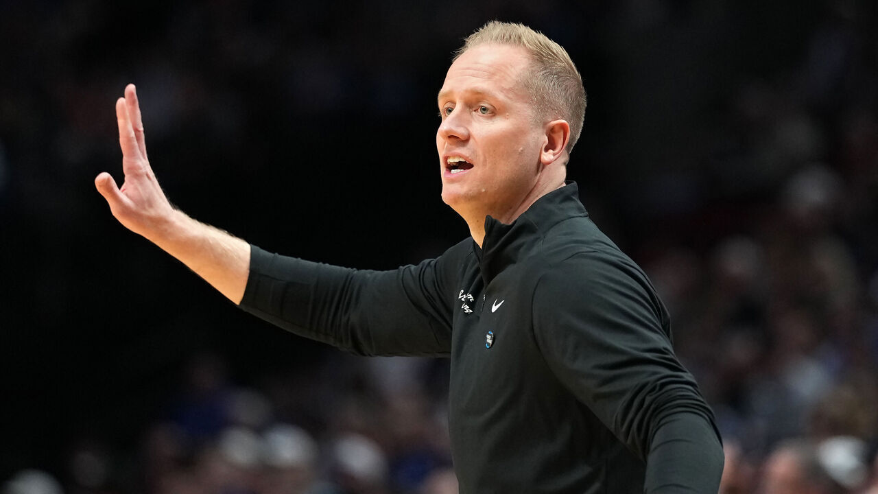 PORTLAND, OREGON - MARCH 19: Head coach Kevin Young of the BYU Cougars calls out instructions against the Texas Longhorns during the first half in the first round of the 2026 NCAA Men's Basketball Tournament at Moda Center on March 19, 2026 in Portland, Oregon.