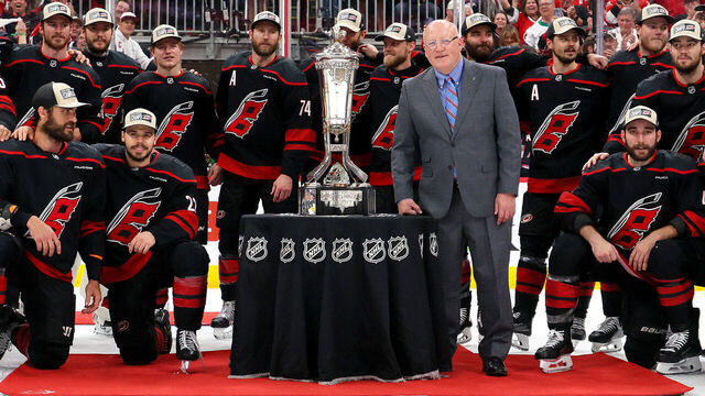 RALEIGH, NORTH CAROLINA - MAY 29: The Carolina Hurricanes pose with the Prince of Whales Trophy following a 6-1 victory over the Montréal Canadiens in Game Five of the Eastern Conference Final of the 2026 Stanley Cup Playoffs at Lenovo Center on May 29, 2026 in Raleigh, North Carolina.