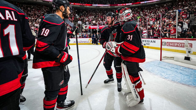 RALEIGH, NORTH CAROLINA - MAY 29: Frederik Andersen #31 of the Carolina Hurricanes celebrates with teammates after a 6-1 victory against the Montréal Canadiens in Game Five of the Eastern Conference Final of the 2026 Stanley Cup Playoffs at Lenovo Center on May 29, 2026 in Raleigh, North Carolina.