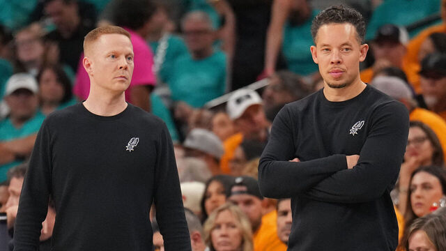 OKLAHOMA CITY, OK - MAY 22: Associate Head Coach Sean Sweeney and Head Coach Mitch Johnson of the San Antonio Spurs look on during the game against the Oklahoma City Thunder during Game Three of the NBA Western Conference Finals on May 22, 2026 at Paycom Center in Oklahoma City, Oklahoma. Mandatory Copyright Notice: Copyright 2026 NBAE