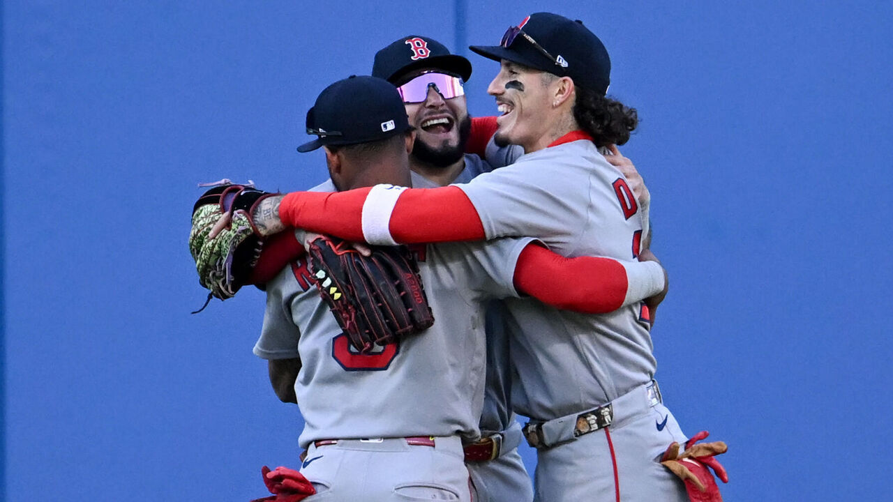 CLEVELAND, OHIO - MAY 30: Ceddanne Rafaela #3, Wilyer Abreu #52 and Jarren Duran #16 of the Boston Red Sox celebrate the team's 9-1 win over the Cleveland Guardians at Progressive Field on May 30, 2026 in Cleveland, Ohio.