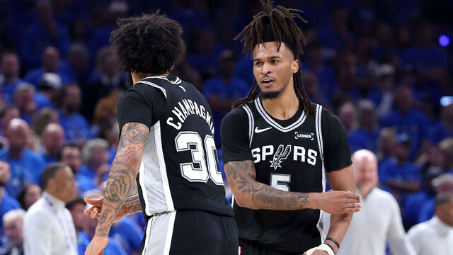 OKLAHOMA CITY, OKLAHOMA - MAY 30: Stephon Castle #5 and Julian Champagnie #30 of the San Antonio Spurs celebrate the play against the Oklahoma City Thunder during the third quarter in Game Seven of the NBA Western Conference Finals at Paycom Center on May 30, 2026 in Oklahoma City, Oklahoma.