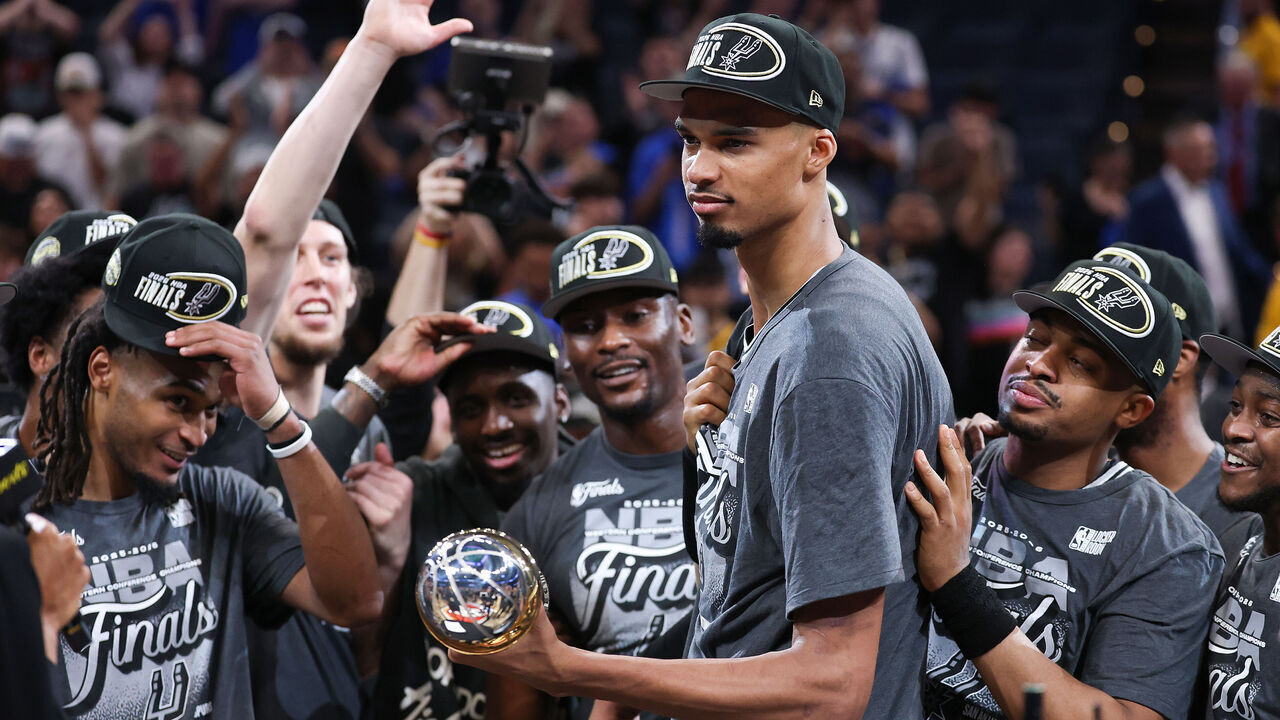 OKLAHOMA CITY, OKLAHOMA - MAY 30: Victor Wembanyama #1 of the San Antonio Spurs celebrates after being awarded the Earvin "Magic" Johnson MVP Trophy after defeating the Oklahoma City Thunder in Game Seven of the NBA Western Conference Finals at Paycom Center on May 30, 2026 in Oklahoma City, Oklahoma.