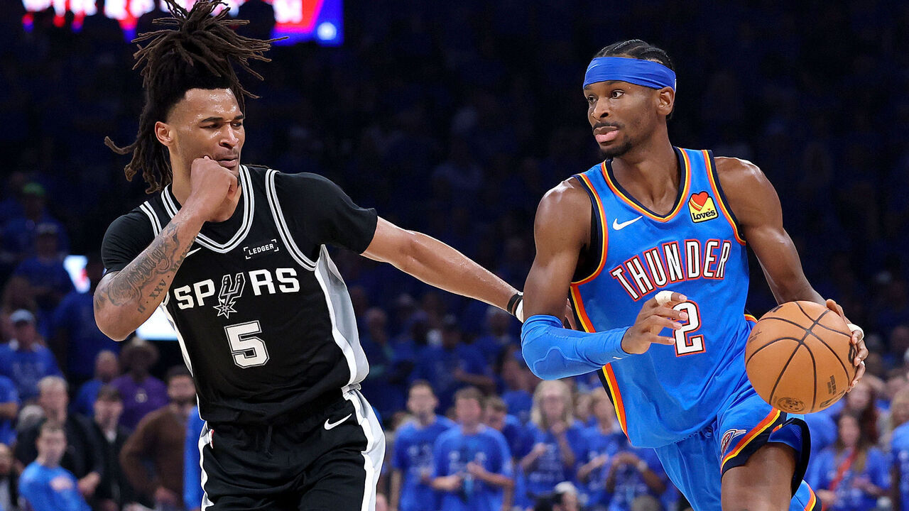 OKLAHOMA CITY, OKLAHOMA - MAY 30: Shai Gilgeous-Alexander #2 of the Oklahoma City Thunder is defended by Stephon Castle #5 of the San Antonio Spurs during the third quarter in Game Seven of the NBA Western Conference Finals at Paycom Center on May 30, 2026 in Oklahoma City, Oklahoma.