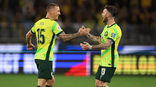 PERTH, AUSTRALIA - JUNE 05: Mitchell Duke & Aiden O'Neill of the Socceroos celebrate the win during the 2026 FIFA World Cup Round Three AFC Asian Qualifier match between Australia Socceroos and Japan at Optus Stadium on June 05, 2025 in Perth, Australia.