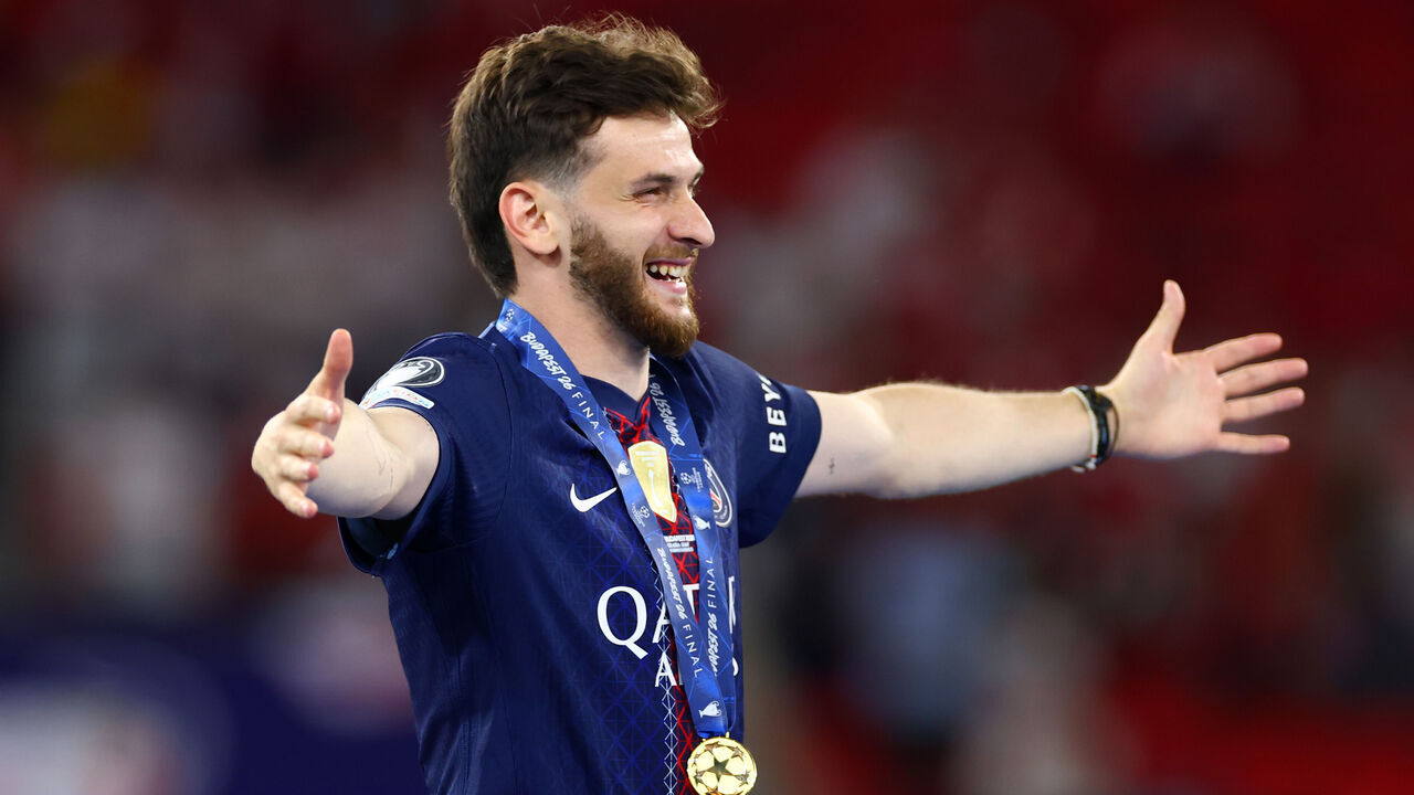 BUDAPEST, HUNGARY - MAY 30: Khvicha Kvaratskhelia of Paris-Saint Germain celebrates at full-time following the UEFA Champions League Final 2026 match between Paris Saint-Germain and Arsenal FC at Puskas Arena on May 30, 2026 in Budapest, Hungary.