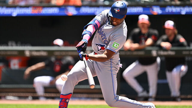 BALTIMORE, MD - MAY 31: Jesús Sánchez #12 of the Toronto Blue Jays hits a single in the second inning against the Baltimore Orioles at Oriole Park at Camden Yards on May 31, 2026 in Baltimore, Maryland.