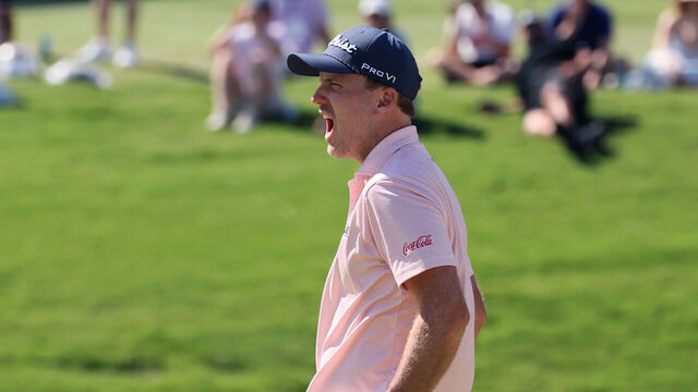 FORT WORTH, TEXAS - MAY 31: Russell Henley of the United States celebrates after a putt on the 18th green during the final round of the Charles Schwab Challenge 2026 at Colonial Country Club on May 31, 2026 in Fort Worth, Texas.