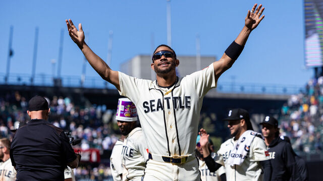 SEATTLE, WASHINGTON - MAY 31: Julio Rodríguez #44 of the Seattle Mariners reacts after a walk-off RBI single by teammate Victor Robles #10 during the 10th inning against the Arizona Diamondbacks at T-Mobile Park on May 31, 2026 in Seattle, Washington.