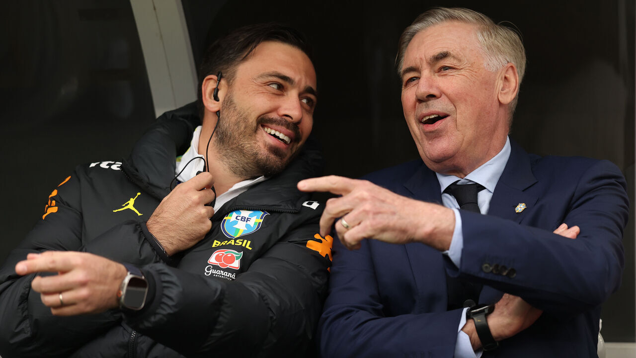 FOXBOROUGH, MASSACHUSETTS - MARCH 26: Carlo Ancelotti, Head Coach of Brazil, chats with his assistant coach Davide Ancelotti during the international friendly match between Brazil and France at Gillette Stadium on March 26, 2026 in Foxborough, Massachusetts.