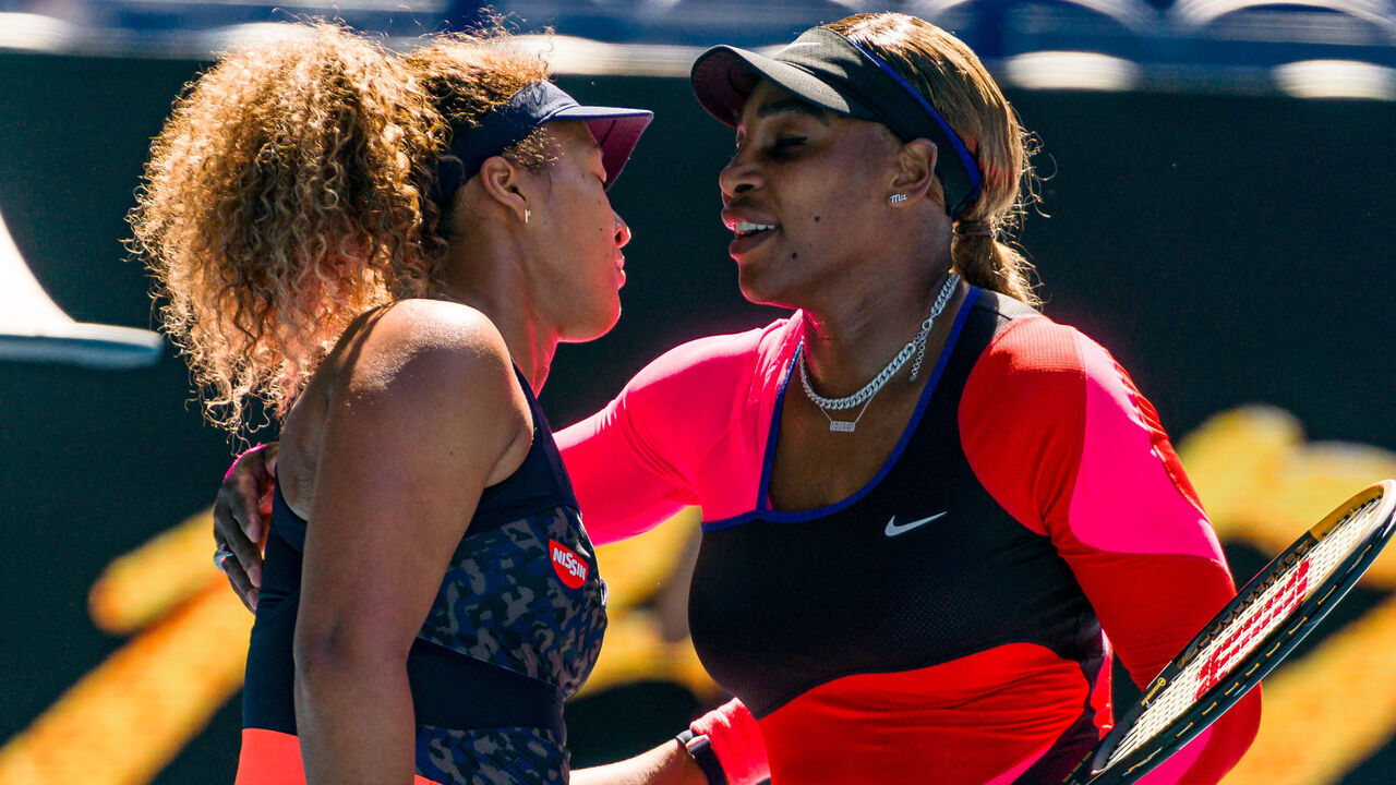 MELBOURNE, AUSTRALIA - FEBRUARY 18: Naomi Osaka of Japan shakes hands with Serena Williams of the United States in their Women’s Singles Semifinals match during day 11 of the 2021 Australian Open at Melbourne Park on February 18, 2021 in Melbourne, Australia.