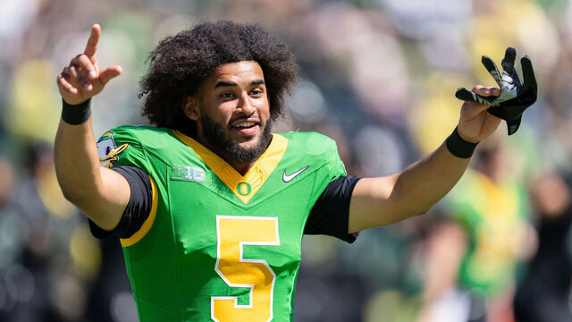 EUGENE, OREGON - APRIL 25: Quarterback Dante Moore #5 of the Oregon Ducks points towards the crowd during the song Shout at the spring football game at Autzen Stadium on April 25, 2026 in Eugene, Oregon.