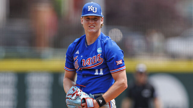 FAYETTEVILLE, ARKANSAS - MAY 31: Cooper Moore #11 of the Kansas Jayhawks pitches during a game against the North Dakota State Bison at Baum-Walker Stadium at George Cole Field during the Fayetteville Regional on May 31, 2025 in Fayetteville, Arkansas. The Bison defeated the Jayhawks 4-3.