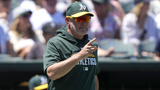 SACRAMENTO, CALIFORNIA - MAY 31: Manager Mark Kotsay #7 of the Athletics signals the bullpen to make a pitching change against the New York Yankees in the top of the third inning of a major league baseball game at Sutter Health Park on May 31, 2026 in Sacramento, California.