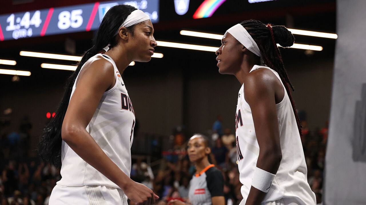 COLLEGE PARK, GEORGIA - JUNE 02: Rhyne Howard #10 of the Atlanta Dream reacts with Angel Reese #5 of the Atlanta Dream after drawing a foul on a basket against the Connecticut Sun during the fourth quarter at Gateway Center Arena on June 02, 2026 in College Park, Georgia.