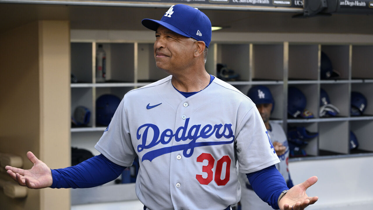 SAN DIEGO, CALIFORNIA - MAY 20: Manager Dave Roberts #30 of the Los Angeles Dodgers gestures before the game against the San Diego Padres at Petco Park on May 20, 2026 in San Diego, California.