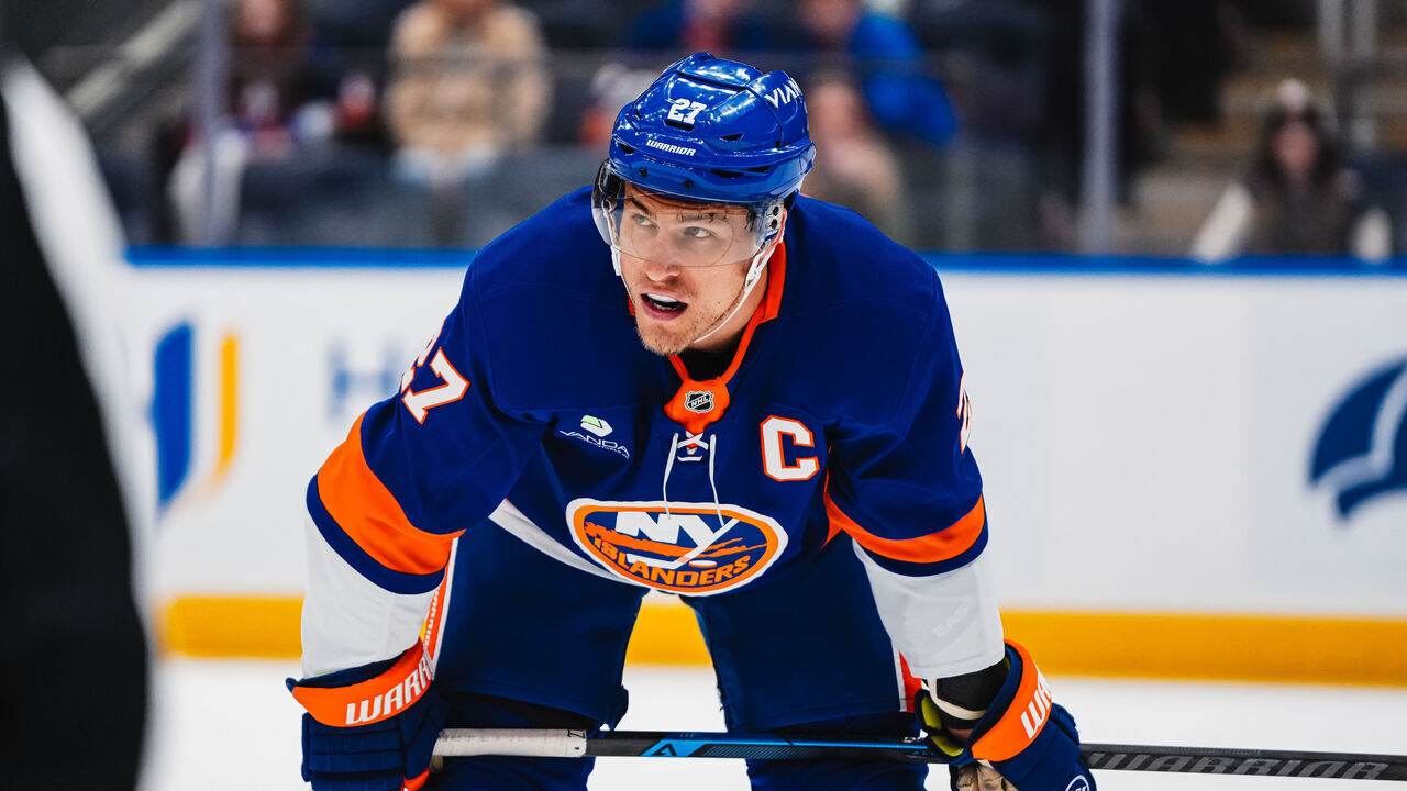ELMONT, NEW YORK - APRIL 12: Anders Lee #27 of the New York Islanders looks on during the first period of the game against the Montreal Canadiens at UBS Arena on April 12, 2026 in Elmont, New York.