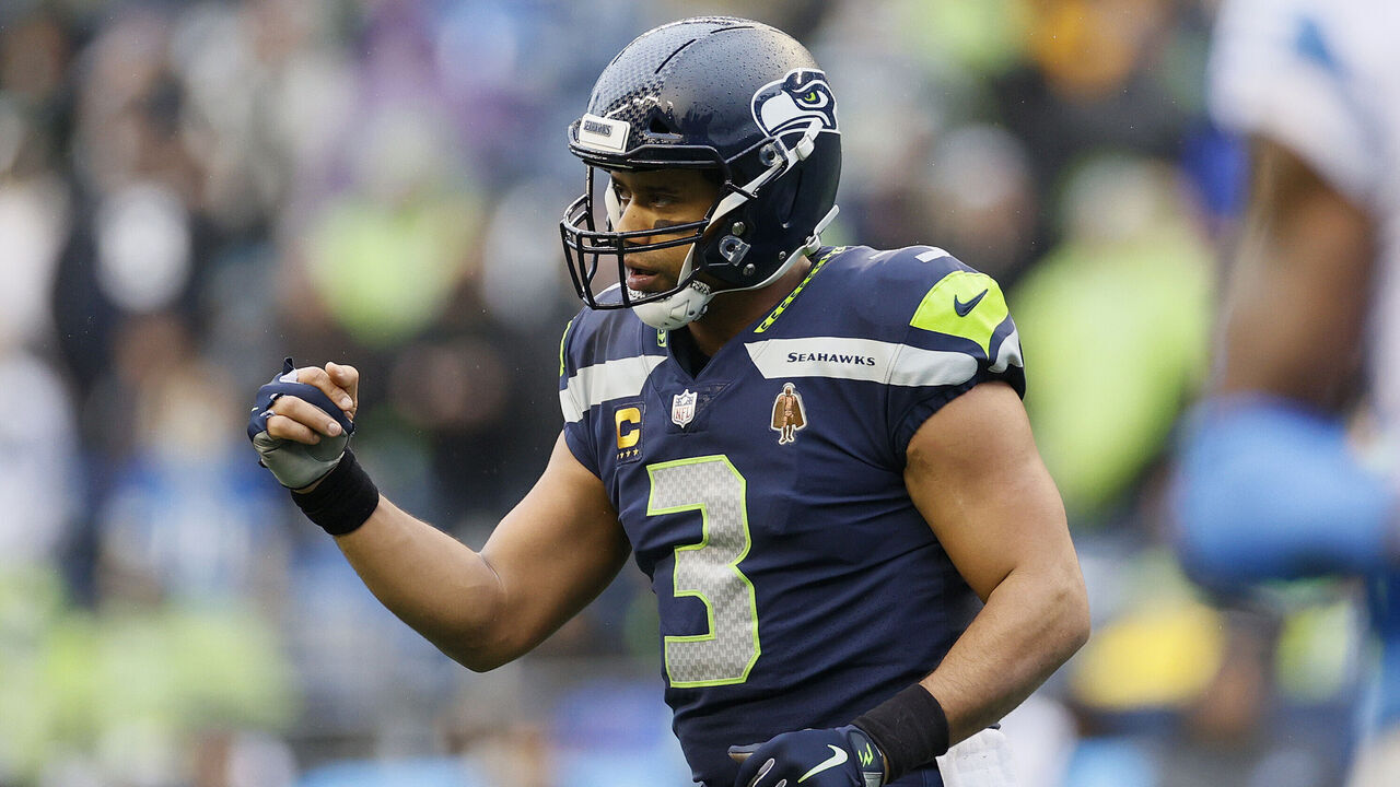 SEATTLE, WASHINGTON - JANUARY 02: Russell Wilson #3 of the Seattle Seahawks celebrates after a touchdown during the second quarter against the Detroit Lions at Lumen Field on January 02, 2022 in Seattle, Washington.