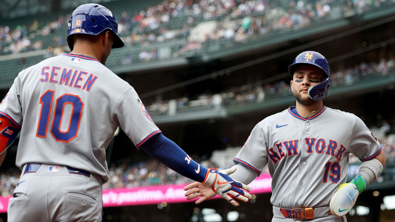 SEATTLE, WASHINGTON - JUNE 03: Bo Bichette #19 of the New York Mets celebrates a run with Marcus Semien #10 during the first inning Mariners at T-Mobile Park on June 03, 2026 in Seattle, Washington.