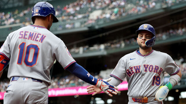 SEATTLE, WASHINGTON - JUNE 03: Bo Bichette #19 of the New York Mets celebrates a run with Marcus Semien #10 during the first inning Mariners at T-Mobile Park on June 03, 2026 in Seattle, Washington.
