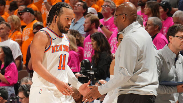 SAN ANTONIO, TX - JUNE 3: Jalen Brunson #11 and Head Coach Mike Brown of the New York Knicks high five during the game against the San Antonio Spurs during Game One of the 2026 NBA Finals on June 3, 2026 at Frost Bank Center in San Antonio, Texas. Mandatory Copyright Notice: Copyright 2026 NBAE