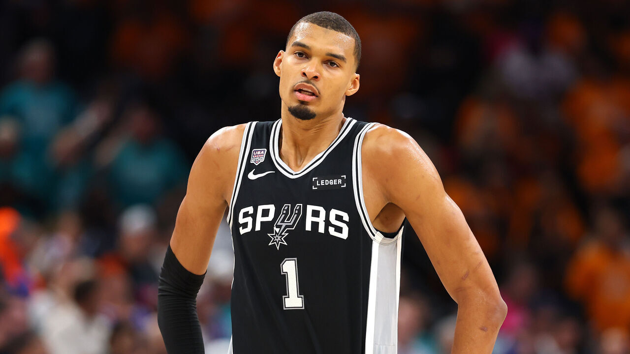 SAN ANTONIO, TEXAS - JUNE 03: Victor Wembanyama #1 of the San Antonio Spurs reacts during the fourth quarter against the New York Knicks in Game One of the 2026 NBA Finals at Frost Bank Center on June 03, 2026 in San Antonio, Texas.