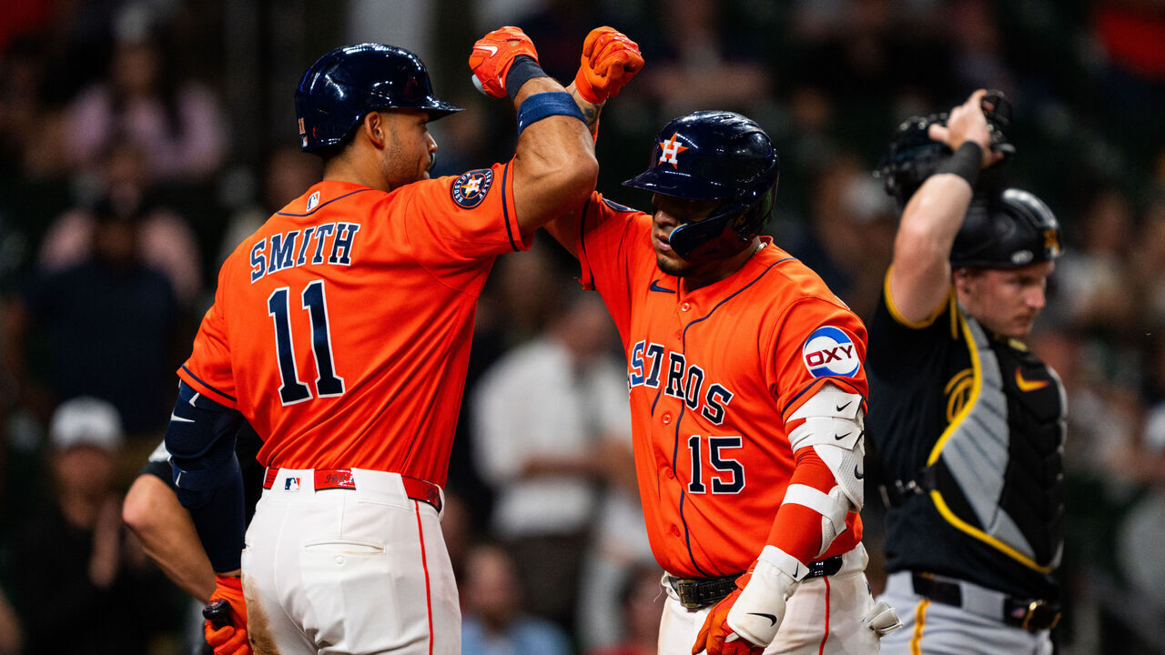HOUSTON, TEXAS - JUNE 03: Isaac Paredes #15 of the Houston Astros reacts with Cam Smith #11 after hitting a two run home run in the seventh inning during a game against the Pittsburgh Pirates at Daikin Park on June 03, 2026 in Houston, Texas.