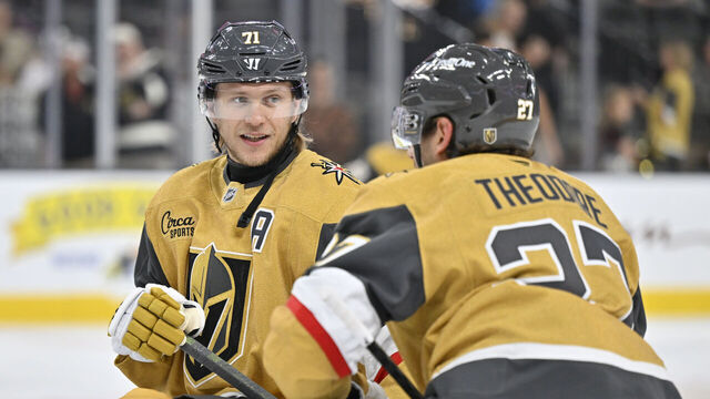 LAS VEGAS, NEVADA - OCTOBER 18: William Karlsson #71 and Shea Theodore #27 of the Vegas Golden Knights talk during warmups prior to a game against the Calgary Flames at T-Mobile Arena on October 18, 2025 in Las Vegas, Nevada.