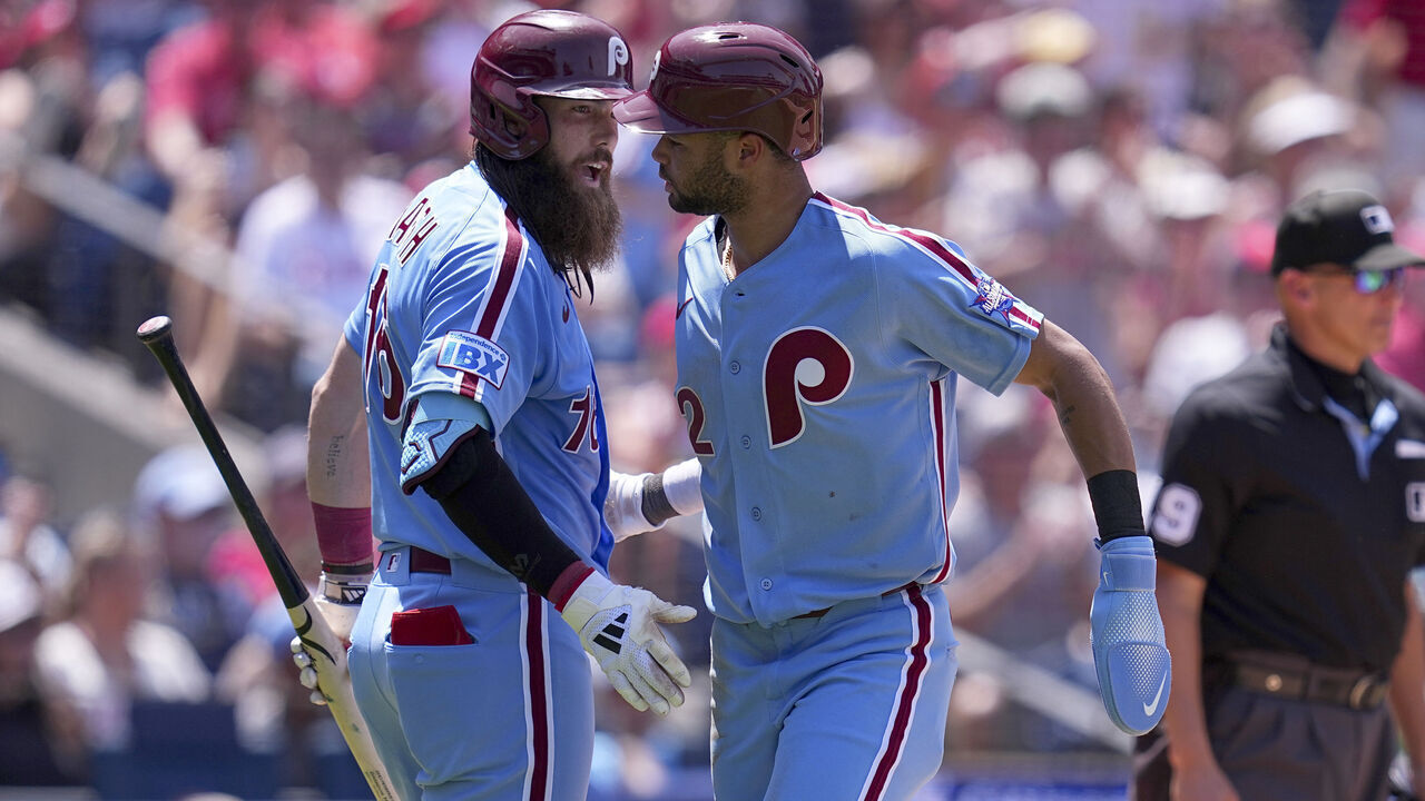 PHILADELPHIA, PENNSYLVANIA - JUNE 4: Justin Crawford #2 of the Philadelphia Phillies celebrates with Brandon Marsh #16 after scoring a run in the bottom of the fifth inning against the San Diego Padres at Citizens Bank Park on June 4, 2026 in Philadelphia, Pennsylvania. The Phillies defeated the Padres 6-4.