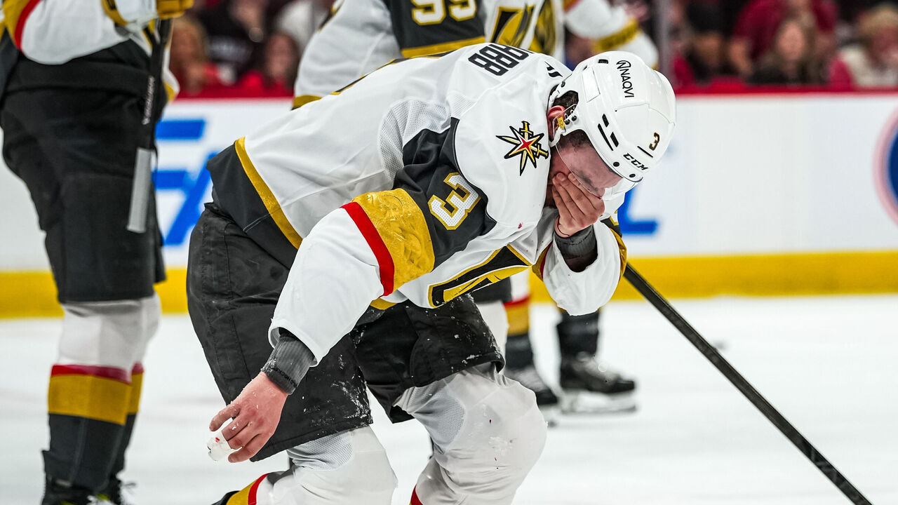 RALEIGH, NORTH CAROLINA - JUNE 04: Brayden McNabb #3 of the Vegas Golden Knights reacts after taking a shot to the face during the first period against the Carolina Hurricanes in Game Two of the 2026 Stanley Cup Final at Lenovo Center on June 04, 2026 in Raleigh, North Carolina.