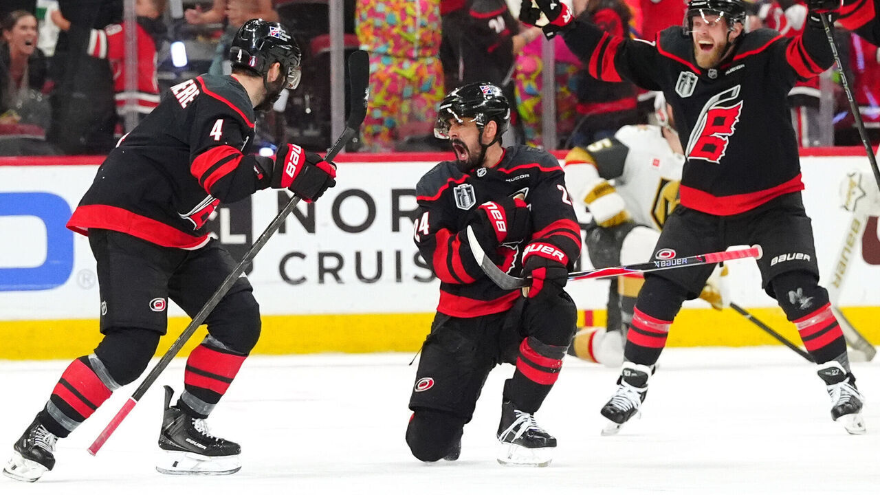 RALEIGH, NORTH CAROLINA - JUNE 04: Seth Jarvis #24 of the Carolina Hurricanes celebrates with teammates after scoring the overtime goal to defeat the Vegas Golden Knights 4-3 in Game Two of the Stanley Cup Final at Lenovo Center on June 04, 2026 in Raleigh, North Carolina.