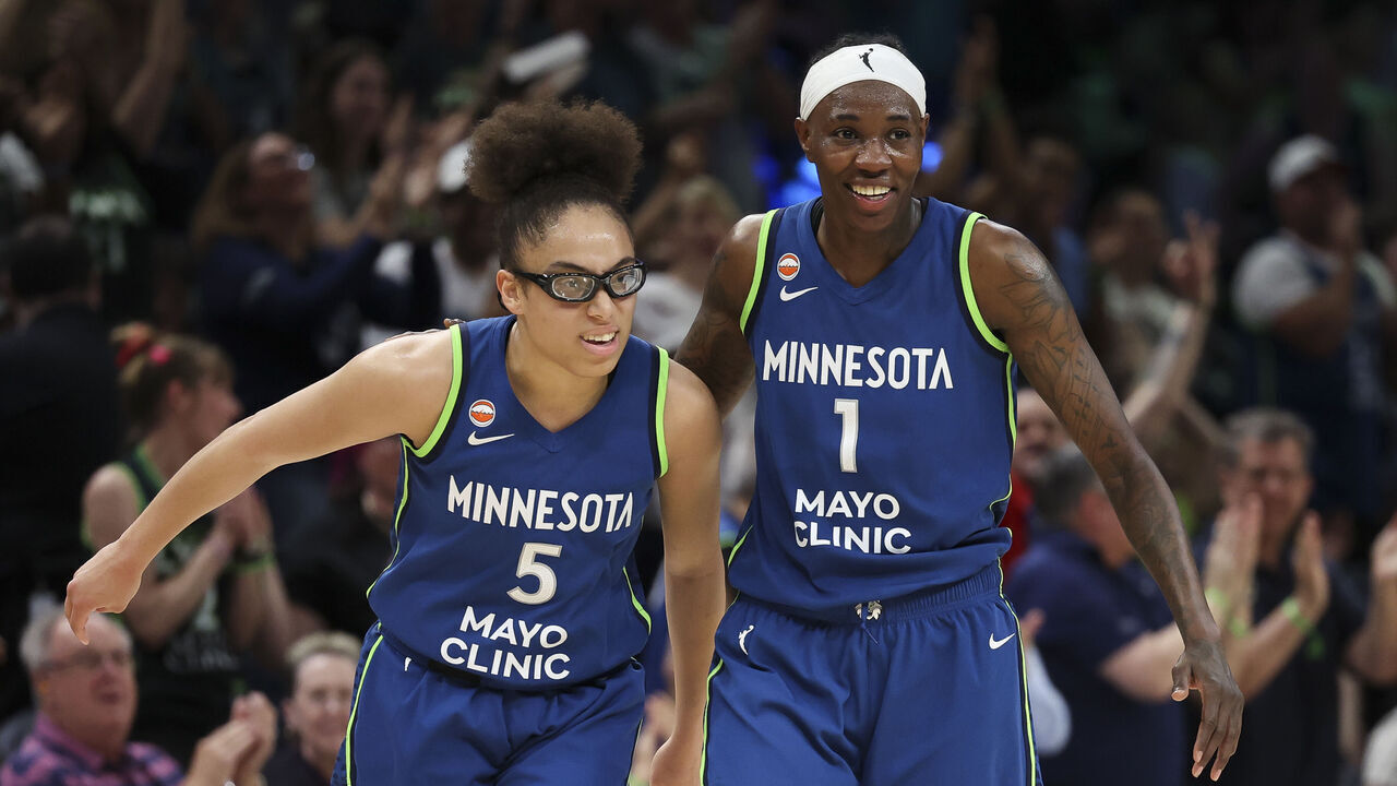 MINNEAPOLIS, MINNESOTA - JUNE 06: Olivia Miles #5 and Natasha Howard #1 of the Minnesota Lynx celebrate during the third quarter against the Seattle Storm at Target Center on JUNE 06, 2026 in Minneapolis, Minnesota.