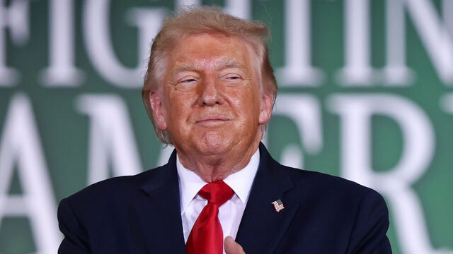 CHIPPEWA FALLS, WISCONSIN - JUNE 05: U.S. President Donald Trump applauds as he arrives to speak during a roundtable on agriculture at Custer Farms on June 05, 2026 in Chippewa Falls, Wisconsin. President Trump delivered remarks on his administration's agricultural policies and efforts to support farmers.
