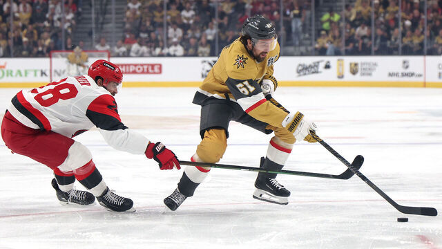 LAS VEGAS, NEVADA - JUNE 06: Mark Stone #61 of the Vegas Golden Knights is defended by William Carrier #28 of the Carolina Hurricanes during the first period in Game Three of the 2026 Stanley Cup Final at T-Mobile Arena on June 06, 2026 in Las Vegas, Nevada.
