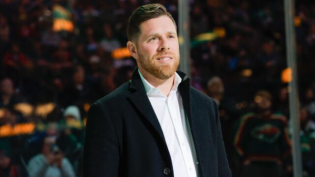 SAINT PAUL, MN - DECEMBER 11: USA hockey hall of fame inductee Joe Pavelski looks on during a ceremony after the second period of an NHL game between the Dallas Stars and Minnesota Wild on December 11th, 2025, at the Grand Casino Arena in St. Paul, MN.
