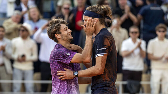 PARIS, FRANCE - JUNE 07: Winner Alexander Zverev of Germany is congratulated by Flavio Cobolli of Italy after the Men's Singles Final on Court Philippe Chatrier at the 2026 French Open Tennis Tournament at Roland Garros on June 7th, 2026, in Paris, France.