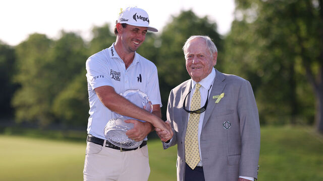 DUBLIN, OHIO - JUNE 07: J.T. Poston of the United States shakes hands with Jack Nicklaus as he presents him the trophyduring the final round of the the Memorial Tournament presented by Workday 2026 at Muirfield Village Golf Club on June 07, 2026 in Dublin, Ohio.