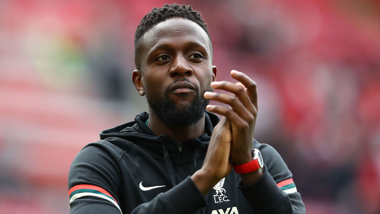 LIVERPOOL, ENGLAND - MAY 22: Divock Origi of Liverpool applauds at the end of the Premier League match between Liverpool and Wolverhampton Wanderers at Anfield on May 22, 2022 in Liverpool, United Kingdom.