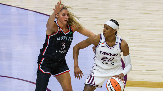 Brittney Sykes #20 (right) is guarded by Sarah Ashlee Barker #3 (left) during a Women's National Basketball Association game between the Toronto Tempo and the Portland Fire at Coca Cola Coliseum in Toronto, Ontario, Canada, on May 23, 2026.