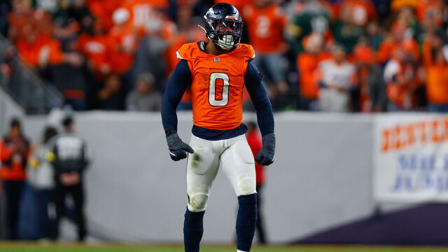DENVER, CO - DECEMBER 14: Jonathon Cooper #0 of the Denver Broncos reacts after a sack during the fourth quarter against the Green Bay Packers at Empower Field at Mile High on December 14, 2025 in Denver, Colorado.