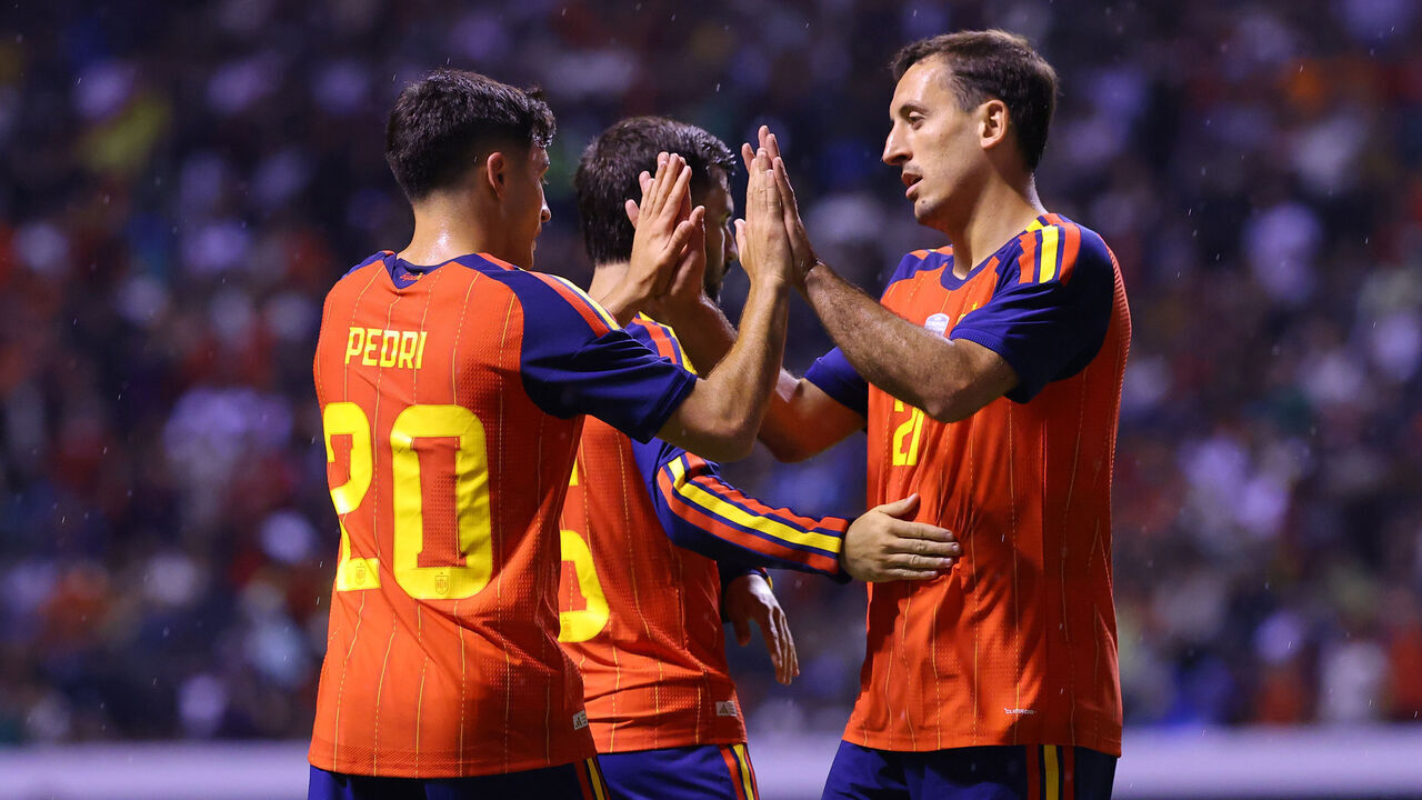 PUEBLA, MEXICO - JUNE 08: Pedri of Spain celebrates with teammate Mikel Oyarzabal after scoring the team's second goal during the international friendly match between Peru and Spain at Estadio Cuauhtémoc on June 08, 2026 in Puebla, Mexico.