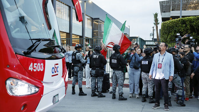 TIJUANA, MEXICO - JUNE 07: Soccer fans wave as the Iranian national soccer team departs on a bus from Tijuana International Airport on June 7, 2026 in Tijuana, Mexico. The team's World Cup participation has been complicated by the Iran war, with the team now training in Tijuana, Mexico instead of Tucson, Arizona amid ongoing U.S. visa processing issues. Iran will play its first two games across the U.S. border in Southern California against New Zealand on June 15 and against Belgium on June 21.